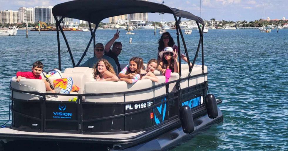 Customers Enjoying the TRITOON 20ft near Peanut Island Blue Water
